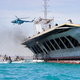 Image for article titled Iran Blows Up Gigantic U.S. Carrier Mock-Up During Naval Exercise